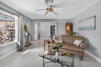 Welcome to this inviting 4-bedroom, 2-bathroom home located in on East Lake Woodlands Country Club in Florida - for sale on GolfHomes.com, golf home, golf lot