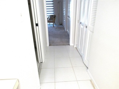 TURNKEY 1 BEDROOM, 1.5 BATHS. TILE IN LIVING AREAS, CARPET IN on Wynmoor Golf Course in Florida - for sale on GolfHomes.com, golf home, golf lot