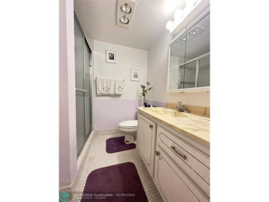 Welcome home to this RARE 1 bdrm, 2 full bath condo on the FIRST on Hillsboro Pines Golf in Florida - for sale on GolfHomes.com, golf home, golf lot