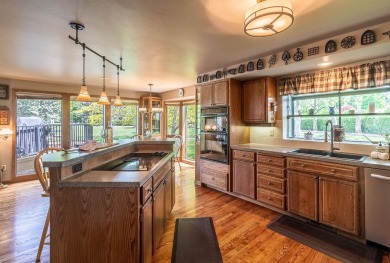 This stunning home is nestled by the 16th green at Manito Golf on Manito Golf and Country Club in Washington - for sale on GolfHomes.com, golf home, golf lot