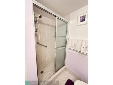 Welcome home to this RARE 1 bdrm, 2 full bath condo on the FIRST on Hillsboro Pines Golf in Florida - for sale on GolfHomes.com, golf home, golf lot