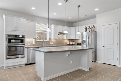 Imagine a home where every day feels like a retreat--welcome to on Frisco Lakes Golf Course in Texas - for sale on GolfHomes.com, golf home, golf lot