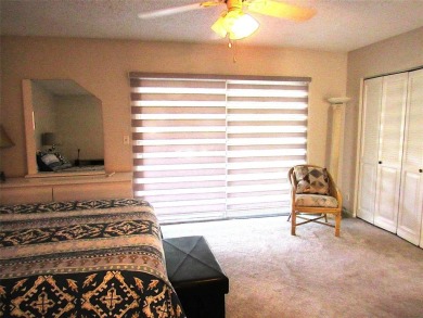 TURNKEY 1 BEDROOM, 1.5 BATHS. TILE IN LIVING AREAS, CARPET IN on Wynmoor Golf Course in Florida - for sale on GolfHomes.com, golf home, golf lot