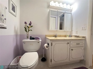 Welcome home to this RARE 1 bdrm, 2 full bath condo on the FIRST on Hillsboro Pines Golf in Florida - for sale on GolfHomes.com, golf home, golf lot