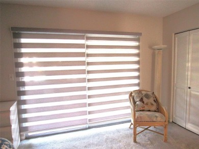 TURNKEY 1 BEDROOM, 1.5 BATHS. TILE IN LIVING AREAS, CARPET IN on Wynmoor Golf Course in Florida - for sale on GolfHomes.com, golf home, golf lot