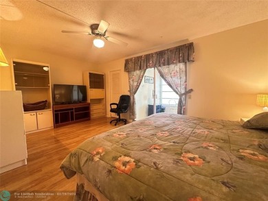 Welcome home to this RARE 1 bdrm, 2 full bath condo on the FIRST on Hillsboro Pines Golf in Florida - for sale on GolfHomes.com, golf home, golf lot
