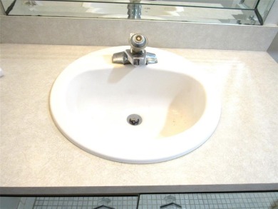 TURNKEY 1 BEDROOM, 1.5 BATHS. TILE IN LIVING AREAS, CARPET IN on Wynmoor Golf Course in Florida - for sale on GolfHomes.com, golf home, golf lot