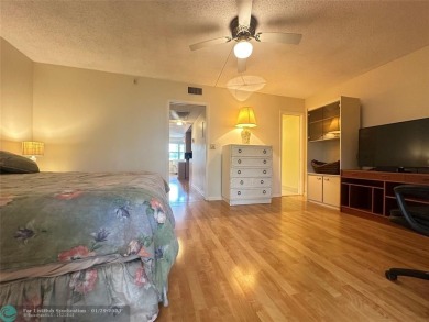 Welcome home to this RARE 1 bdrm, 2 full bath condo on the FIRST on Hillsboro Pines Golf in Florida - for sale on GolfHomes.com, golf home, golf lot