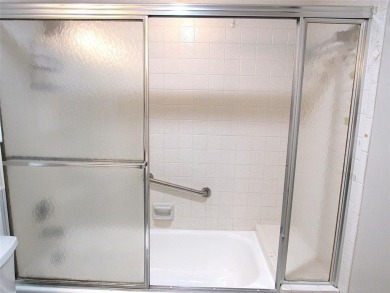 TURNKEY 1 BEDROOM, 1.5 BATHS. TILE IN LIVING AREAS, CARPET IN on Wynmoor Golf Course in Florida - for sale on GolfHomes.com, golf home, golf lot