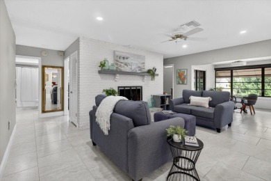 Welcome to this inviting 4-bedroom, 2-bathroom home located in on East Lake Woodlands Country Club in Florida - for sale on GolfHomes.com, golf home, golf lot