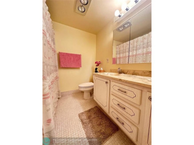 Welcome home to this RARE 1 bdrm, 2 full bath condo on the FIRST on Hillsboro Pines Golf in Florida - for sale on GolfHomes.com, golf home, golf lot
