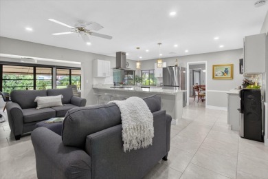 Welcome to this inviting 4-bedroom, 2-bathroom home located in on East Lake Woodlands Country Club in Florida - for sale on GolfHomes.com, golf home, golf lot