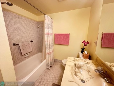 Welcome home to this RARE 1 bdrm, 2 full bath condo on the FIRST on Hillsboro Pines Golf in Florida - for sale on GolfHomes.com, golf home, golf lot
