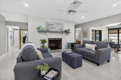 Welcome to this inviting 4-bedroom, 2-bathroom home located in on East Lake Woodlands Country Club in Florida - for sale on GolfHomes.com, golf home, golf lot