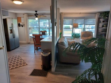 The Lot Rent for this home is $1,047.00/monthly. A cozy on Lake Fairways Country Club in Florida - for sale on GolfHomes.com, golf home, golf lot