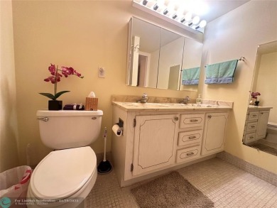Welcome home to this RARE 1 bdrm, 2 full bath condo on the FIRST on Hillsboro Pines Golf in Florida - for sale on GolfHomes.com, golf home, golf lot