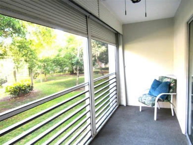 TURNKEY 1 BEDROOM, 1.5 BATHS. TILE IN LIVING AREAS, CARPET IN on Wynmoor Golf Course in Florida - for sale on GolfHomes.com, golf home, golf lot