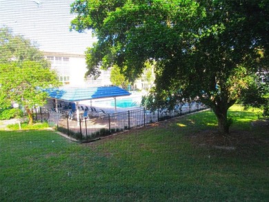 TURNKEY 1 BEDROOM, 1.5 BATHS. TILE IN LIVING AREAS, CARPET IN on Wynmoor Golf Course in Florida - for sale on GolfHomes.com, golf home, golf lot