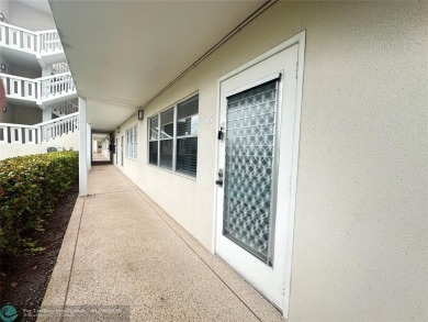 Welcome home to this RARE 1 bdrm, 2 full bath condo on the FIRST on Hillsboro Pines Golf in Florida - for sale on GolfHomes.com, golf home, golf lot