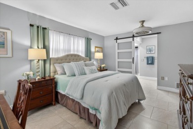 Welcome to this inviting 4-bedroom, 2-bathroom home located in on East Lake Woodlands Country Club in Florida - for sale on GolfHomes.com, golf home, golf lot