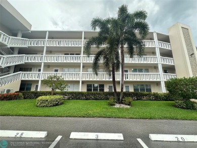 Welcome home to this RARE 1 bdrm, 2 full bath condo on the FIRST on Hillsboro Pines Golf in Florida - for sale on GolfHomes.com, golf home, golf lot
