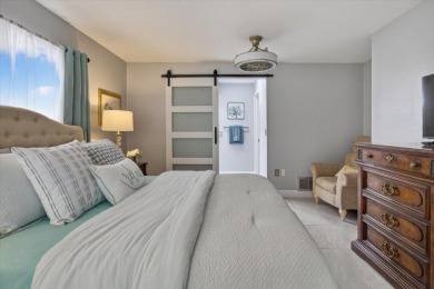 Welcome to this inviting 4-bedroom, 2-bathroom home located in on East Lake Woodlands Country Club in Florida - for sale on GolfHomes.com, golf home, golf lot