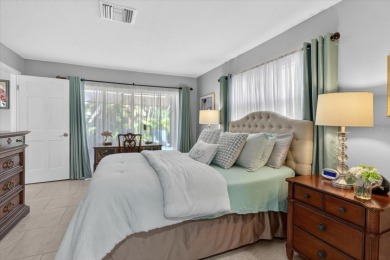 Welcome to this inviting 4-bedroom, 2-bathroom home located in on East Lake Woodlands Country Club in Florida - for sale on GolfHomes.com, golf home, golf lot