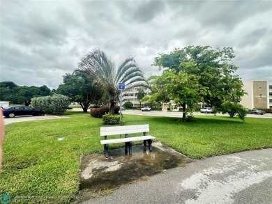 Welcome home to this RARE 1 bdrm, 2 full bath condo on the FIRST on Hillsboro Pines Golf in Florida - for sale on GolfHomes.com, golf home, golf lot
