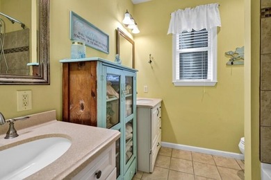 Discover the ultimate coastal retreat in this stunning custom on The Plantation Course At Edisto in South Carolina - for sale on GolfHomes.com, golf home, golf lot