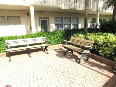 TURNKEY 1 BEDROOM, 1.5 BATHS. TILE IN LIVING AREAS, CARPET IN on Wynmoor Golf Course in Florida - for sale on GolfHomes.com, golf home, golf lot