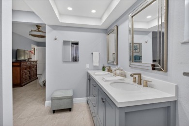 Welcome to this inviting 4-bedroom, 2-bathroom home located in on East Lake Woodlands Country Club in Florida - for sale on GolfHomes.com, golf home, golf lot