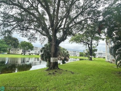 Welcome home to this RARE 1 bdrm, 2 full bath condo on the FIRST on Hillsboro Pines Golf in Florida - for sale on GolfHomes.com, golf home, golf lot