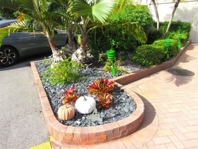 TURNKEY 1 BEDROOM, 1.5 BATHS. TILE IN LIVING AREAS, CARPET IN on Wynmoor Golf Course in Florida - for sale on GolfHomes.com, golf home, golf lot