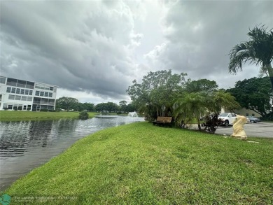Welcome home to this RARE 1 bdrm, 2 full bath condo on the FIRST on Hillsboro Pines Golf in Florida - for sale on GolfHomes.com, golf home, golf lot