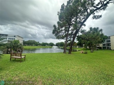 Welcome home to this RARE 1 bdrm, 2 full bath condo on the FIRST on Hillsboro Pines Golf in Florida - for sale on GolfHomes.com, golf home, golf lot