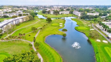 TURNKEY 1 BEDROOM, 1.5 BATHS. TILE IN LIVING AREAS, CARPET IN on Wynmoor Golf Course in Florida - for sale on GolfHomes.com, golf home, golf lot