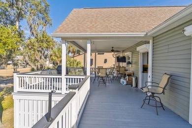 Discover the ultimate coastal retreat in this stunning custom on The Plantation Course At Edisto in South Carolina - for sale on GolfHomes.com, golf home, golf lot