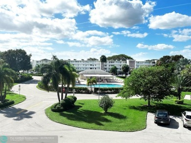 Welcome home to this RARE 1 bdrm, 2 full bath condo on the FIRST on Hillsboro Pines Golf in Florida - for sale on GolfHomes.com, golf home, golf lot