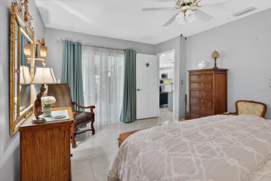 Welcome to this inviting 4-bedroom, 2-bathroom home located in on East Lake Woodlands Country Club in Florida - for sale on GolfHomes.com, golf home, golf lot