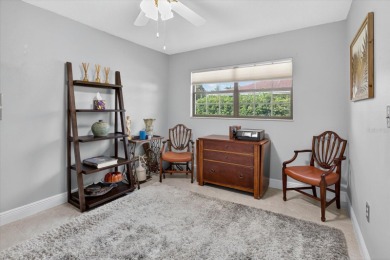 Welcome to this inviting 4-bedroom, 2-bathroom home located in on East Lake Woodlands Country Club in Florida - for sale on GolfHomes.com, golf home, golf lot