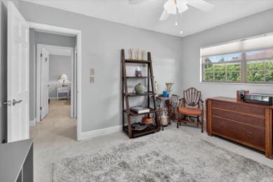 Welcome to this inviting 4-bedroom, 2-bathroom home located in on East Lake Woodlands Country Club in Florida - for sale on GolfHomes.com, golf home, golf lot