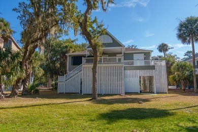Discover the ultimate coastal retreat in this stunning custom on The Plantation Course At Edisto in South Carolina - for sale on GolfHomes.com, golf home, golf lot