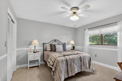 Welcome to this inviting 4-bedroom, 2-bathroom home located in on East Lake Woodlands Country Club in Florida - for sale on GolfHomes.com, golf home, golf lot