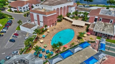 Welcome home to this RARE 1 bdrm, 2 full bath condo on the FIRST on Hillsboro Pines Golf in Florida - for sale on GolfHomes.com, golf home, golf lot