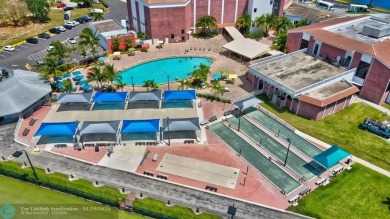 Welcome home to this RARE 1 bdrm, 2 full bath condo on the FIRST on Hillsboro Pines Golf in Florida - for sale on GolfHomes.com, golf home, golf lot