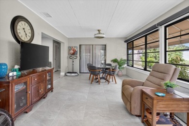 Welcome to this inviting 4-bedroom, 2-bathroom home located in on East Lake Woodlands Country Club in Florida - for sale on GolfHomes.com, golf home, golf lot