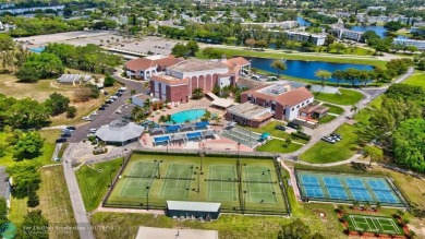 Welcome home to this RARE 1 bdrm, 2 full bath condo on the FIRST on Hillsboro Pines Golf in Florida - for sale on GolfHomes.com, golf home, golf lot
