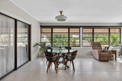 Welcome to this inviting 4-bedroom, 2-bathroom home located in on East Lake Woodlands Country Club in Florida - for sale on GolfHomes.com, golf home, golf lot