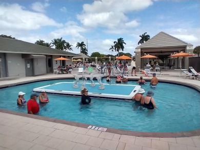 TURNKEY 1 BEDROOM, 1.5 BATHS. TILE IN LIVING AREAS, CARPET IN on Wynmoor Golf Course in Florida - for sale on GolfHomes.com, golf home, golf lot