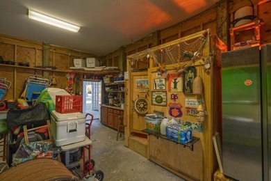 Discover the ultimate coastal retreat in this stunning custom on The Plantation Course At Edisto in South Carolina - for sale on GolfHomes.com, golf home, golf lot